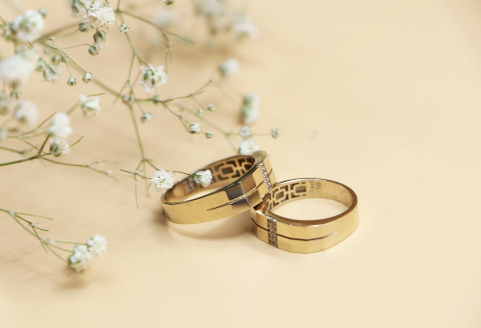 Gold rings with delicate floral accents